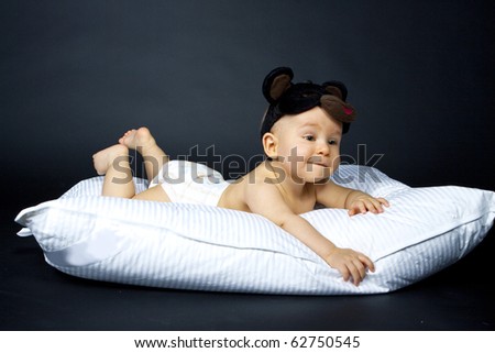 happy baby on pillow