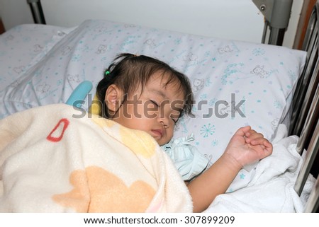 Asian Kids (Thai) Girl A Sleep On A Sick Bed In Hospital