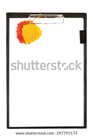 Black plastic clipboard with metal clip, blank paper sheet and yellow and red autumn tree leaves, isolated on white background