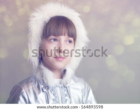 Pretty girl dressed as the snow maiden