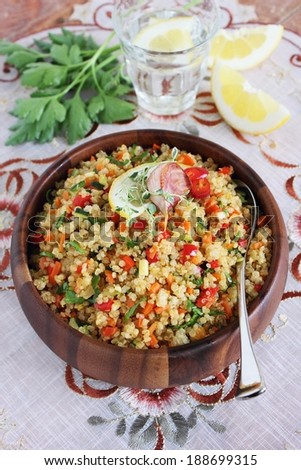 Quinoa salad with vegetables mix,lemon and thyme.