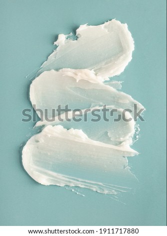 Cosmetic product creamy gel texture smudge on pastel blue background Foto d'archivio © 