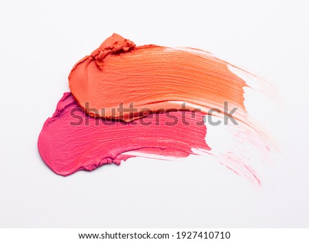 Lipstick abstract strokes smudges  background texture multi colored on gray background Foto d'archivio © 
