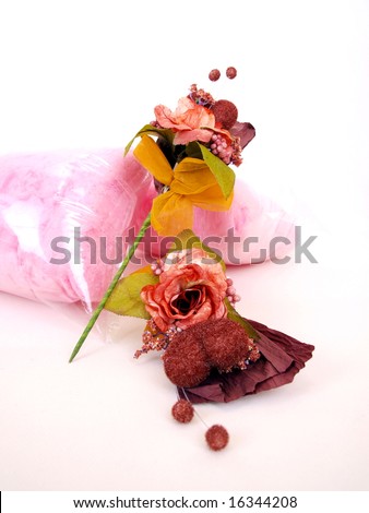 two Paper flower art used in wedding ceremonies as gift with packed candy floss