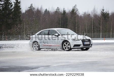 NOKIA, FINLAND - February 2, 2014: The Audi Quattro Tour 2014 test drive day in Nokia, Finland. Professional drivers were teaching how to drive safely in winter conditions on February 2, 2014.