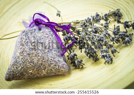 Sachet of Lavender seeds with dried lavender flowers