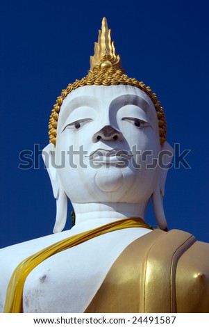 a weathered thai buddha statue