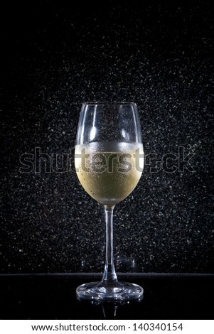 cold sparkling wine with marble background