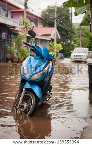 BANGKOK - OCTOBER 19: In village the flood after the heaviest rain on October 19, 2013 in Bangkok, Thailand.