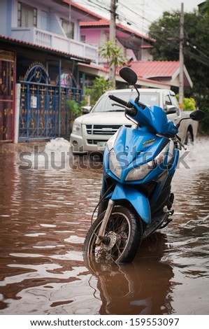 BANGKOK - OCTOBER 19: In village the flood after the heaviest rain on October 19, 2013 in Bangkok, Thailand.