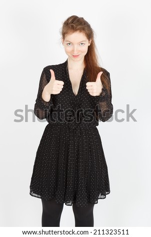 Beautiful businesswoman doing different expressions in different sets of clothes: thumbs up