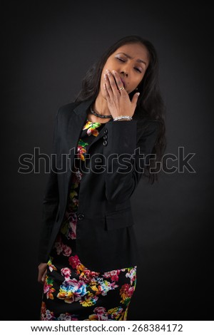 beautiful woman doing different expressions in different sets of clothes: yawn