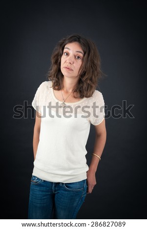 Beautiful woman doing different expressions in different sets of clothes: bored