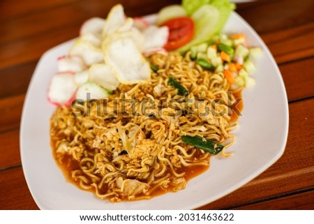 Javanese noodle (mie goreng tek tek) on a plate Stok fotoğraf © 