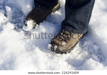 Walking boots in the snow