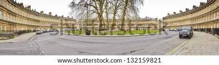 BATH, ENGLAND - MARCH 1: The Circus on March 1, 2013 in Bath, England. The Circus is a street of terraced houses laid out in a sweeping crescent and is a popular tourist attraction.