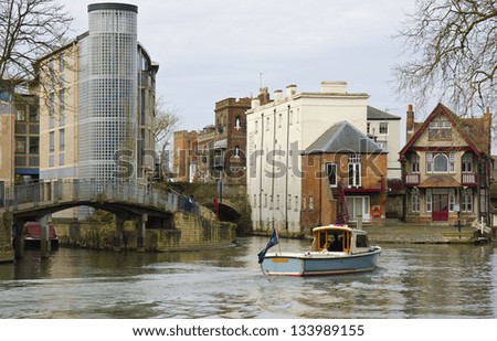 OXFORD, ENGLAND - FEBRUARY 28: the River Thames at Oxford on February 28, 2013 in Oxford, England. The River Thames is the longest river entirely in England and flows through Oxford and London.