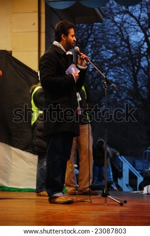 EDINBURGH - JANUARY 10: A speaker on stage at the anti-Israel rally in Princes Street Gardens January 10th, 2009 in Edinburgh, Scotland.