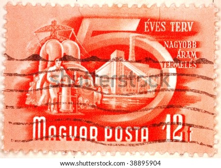 HUNGARY - CIRCA 1950: A stamp printed in Hungary shows image celebrating the five year plan for increased productivity, series, circa 1950