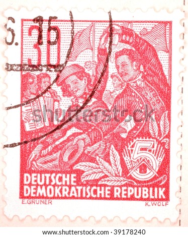 EAST GERMANY - CIRCA 1956: A stamp printed in East Germany shows image of two dancers, series, circa 1956