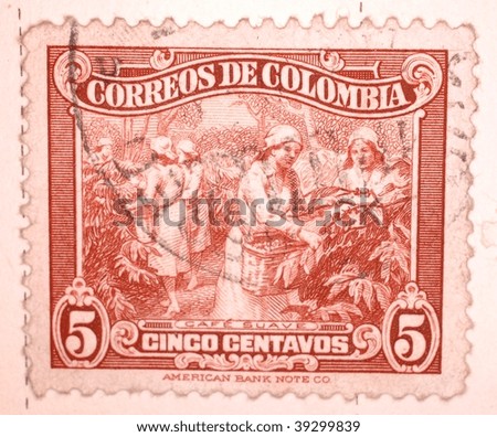 COLOMBIA - CIRCA 1932: A stamp printed in Colombia shows image of women collecting coffee beans, series, circa 1932