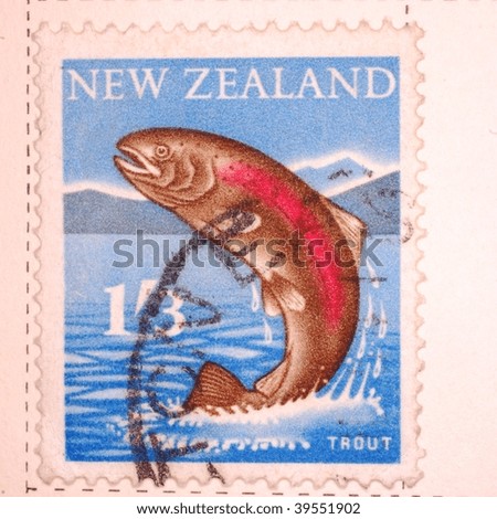NEW ZEALAND - CIRCA 1923: A stamp printed in New Zealand shows image of a trout jumping out of water, series, circa 1923