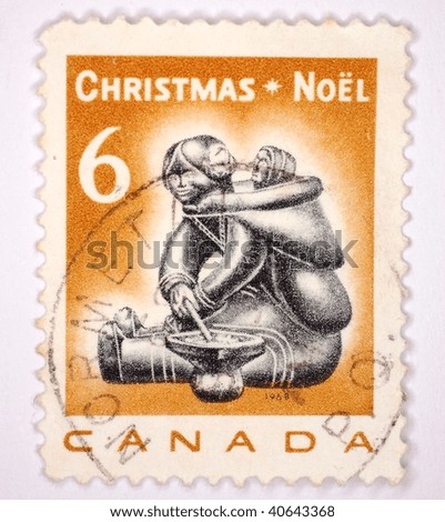 CANADA - CIRCA 1988: A stamp printed in Canada shows image of native Canadians at Christmas, series, circa 1988