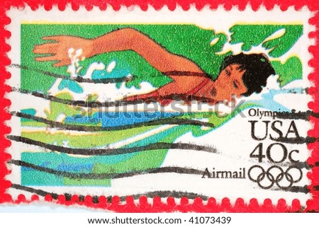 UNITED STATES OF AMERICA - CIRCA 1984: A stamp printed in the United States of America shows image of a swimmer, series, circa 1984