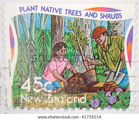 NEW ZEALAND - CIRCA 2001: A stamp printed in New Zealand shows image of people planting native trees and shrubs, series, circa 2001