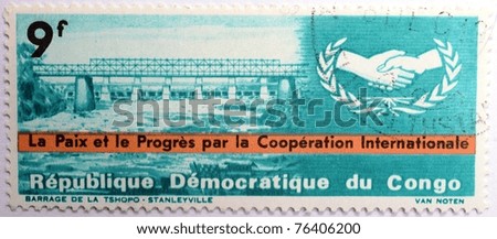 DEMOCRATIC REPUBLIC OF CONGO - CIRCA 1965: A stamp from the Democratic Republic of Congo shows image of the Tshopo Dam at Stanleyville, circa 1965