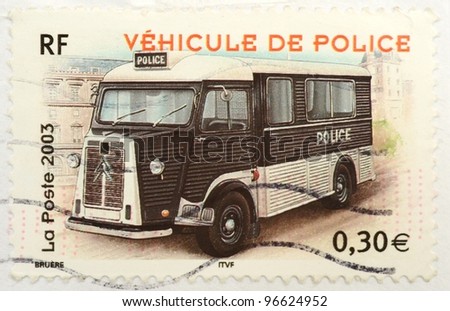 FRANCE - CIRCA 2003: a stamp from France shows image of a vintage police van, circa 2003