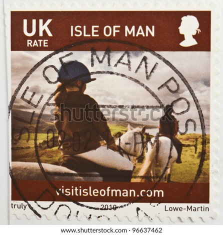 UNITED KINGDOM - CIRCA 2010: a stamp from the United Kingdom shows image of a girl riding a horse, circa 2010