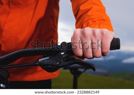 Similar – Image, Stock Photo Cyclist, not holding holds
