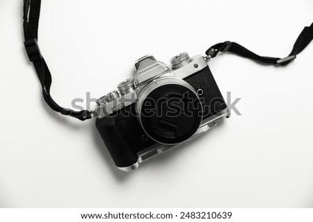 Similar – Image, Stock Photo Vintage camera on top of a stack of books