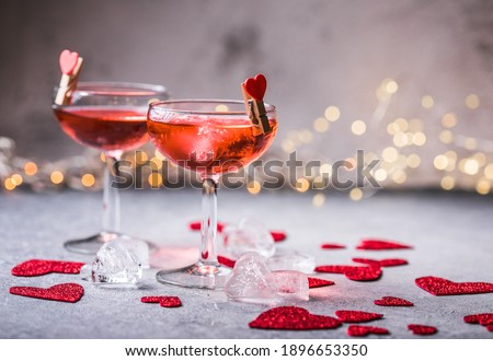 Similar – Image, Stock Photo Red alcohol cocktail with black olive and whiskey lemon cocktail