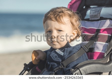 Similar – Foto Bild Spaziergänger mit Brandung am Strand von Sao Pedro de Moel in Portugal