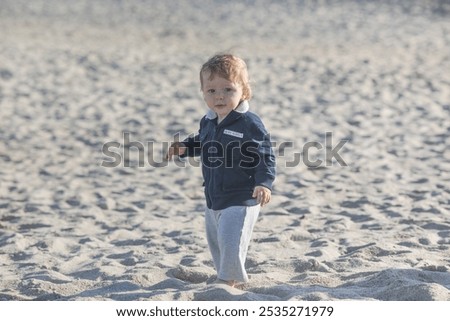 Similar – Foto Bild Spaziergänger mit Brandung am Strand von Sao Pedro de Moel in Portugal