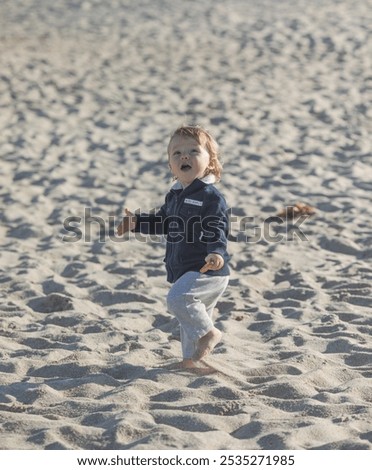 Similar – Foto Bild Spaziergänger mit Brandung am Strand von Sao Pedro de Moel in Portugal