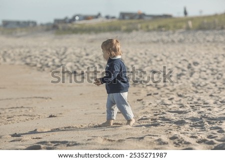 Similar – Foto Bild Spaziergänger mit Brandung am Strand von Sao Pedro de Moel in Portugal