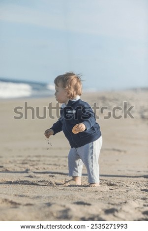 Similar – Foto Bild Spaziergänger mit Brandung am Strand von Sao Pedro de Moel in Portugal