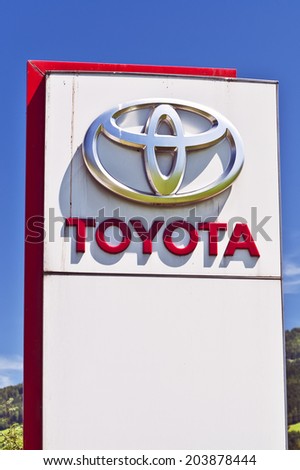 AUSTRIA - JULY 02:TOYOTA logo in the blue sky on July 02,2014 in Austria.Toyota Motor Corporation is a Japanese automaker headquartered in Toyota, Aichi, Japan.