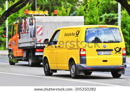 FRANKFURT,GERMANY - MAY 27:  Deutsche Post car on the street on May 27, 2014 in Frankfurt,Germany.The Deutsche Post is the world largest logistics company with over 400.000 employees.