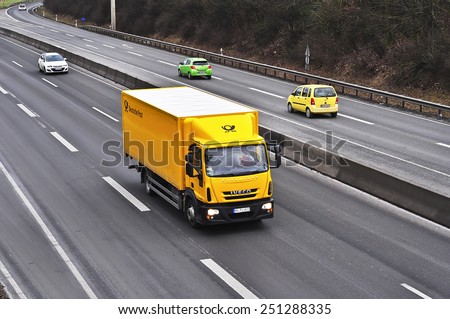 MAINZ, GERMANY - FEB 09: DEUTSCHE POST truck on the highway on February 09, 2015 in Mainz, Germany.