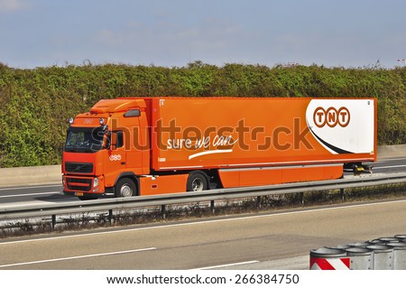 FRANKFURT,GERMANY- MARCH 28:TNT delivery truck on the highway on March28,2015 in Frankfurt,Germany.TNT is an international courier delivery services company with headquarters in Hoofddorp, Netherlands