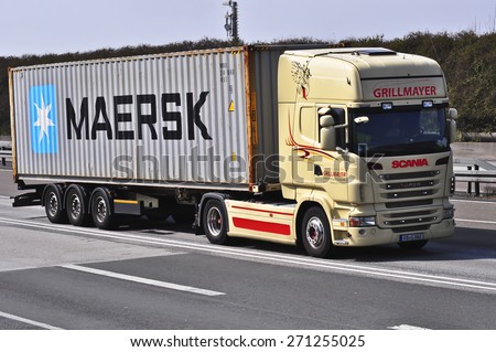 FRANKFURT,GERMANY-MARCH 26:SCANIA truck on the highway on March 26,2015 in Frankfurt,Germany.Scania, is a major Swedish automotive industry manufacturer of specifically heavy trucks and buses.