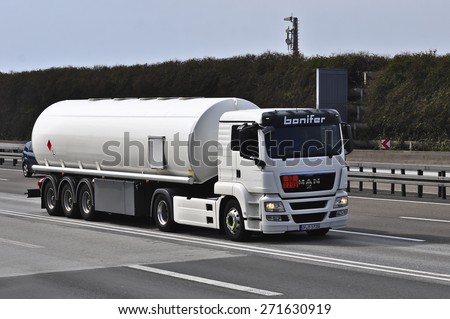 FRANKFURT,GERMANY-MARCH 28:MAN oil truck on the highway on March 28,2015 in Frankfurt,Germany. MAN SE, formerly MAN AG, is a German mechanical engineering company and parent company of the MAN Group.