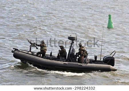 KLAIPEDA,LITHUANIA-JULY 17:military boat patrolling in port Klaipeda on July 17,2015 in Klaipeda,