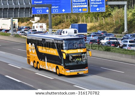 FRANKFURT,GERMANY-AUG 21:double-decker LUFTHANSA AIRPORT BUS on the highway on August 21,2015 in Frankfurt,Germany.Lufthansa, is the flag carrier of Germany and also the largest airline in Europe.
