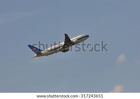 FRANKFURT,GERMANY-AUG 21:airplane of China Southern Airlines Cargo above the Frankfurt airport on August 21,2015 in Frankfurt,Germany.China Southern Cargo provides intercontinental freighter service.