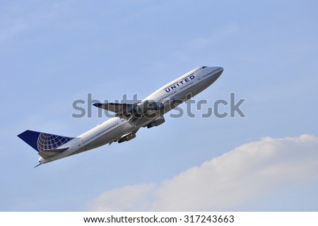 FRANKFURT,GERMANY-AUG 21:airplane of United Airlines above the Frankfurt airport on August 21,2015 in Frankfurt,Germany.United is a major American airline carrier headquartered in Chicago, Illinois.